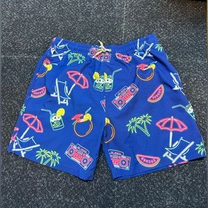 Cute little boys swimming trunks! The neon will make your little baby shine:)))